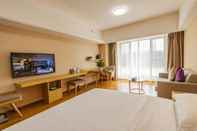 Phòng ngủ Licai Tianxiang Hotel