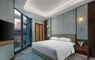 Bedroom 5 Jinzhou Blossom Hotel