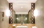 In-room Bathroom 6 Silver Waves Resort & Spa Daman,member of Radisson