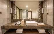 In-room Bathroom 2 Silver Waves Resort & Spa Daman,member of Radisson