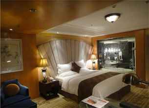 Kamar Tidur 4 Jinlong Holiday Hotel