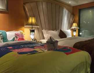 Kamar Tidur 2 Jinlong Holiday Hotel