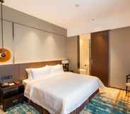 Kamar Tidur 6 Infinite Shine Hotel