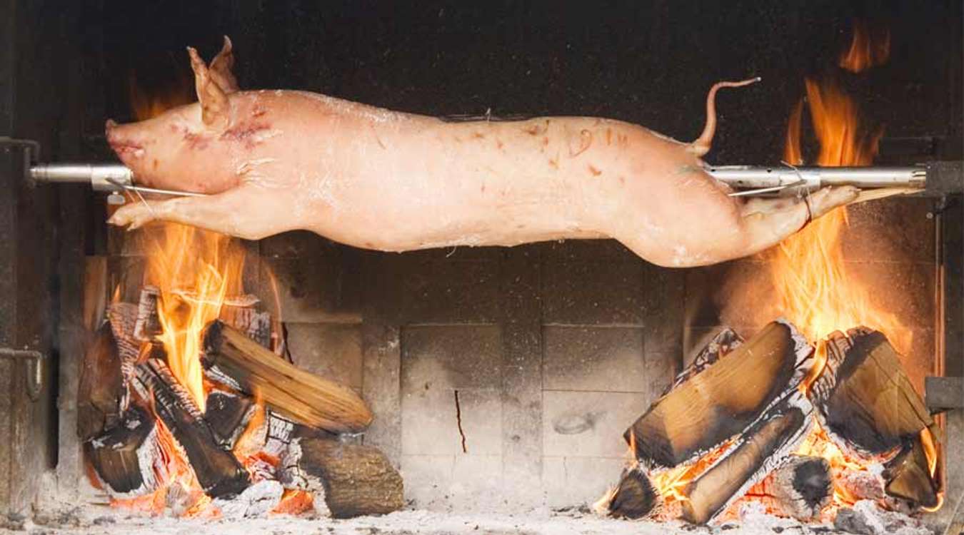 Lechon Roasting in Stainless Tubes