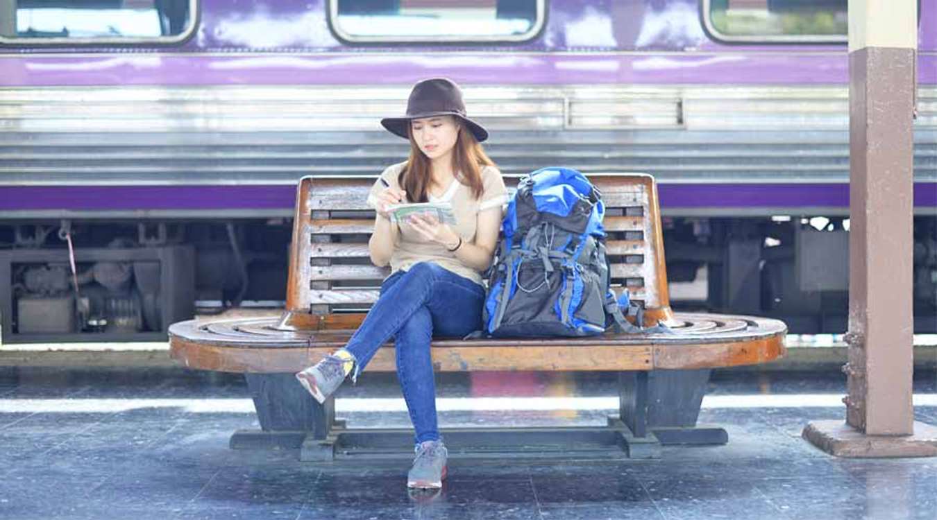 Woman in solving subway map