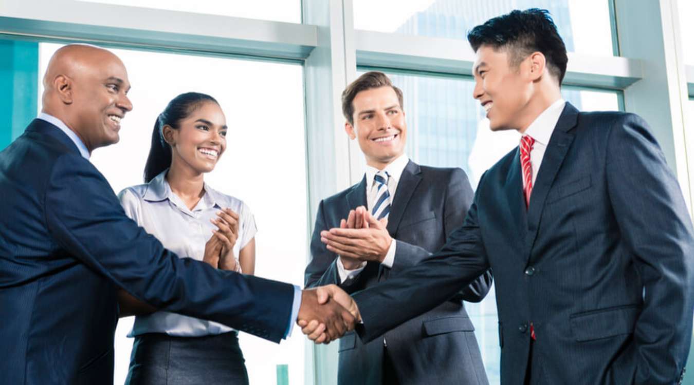 Business Man Shaking Hands In Meeting