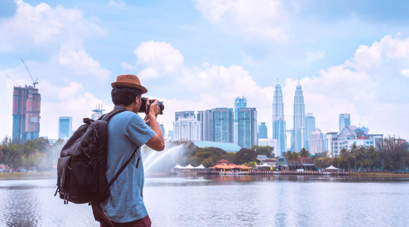 Male Traveler Taking Photos