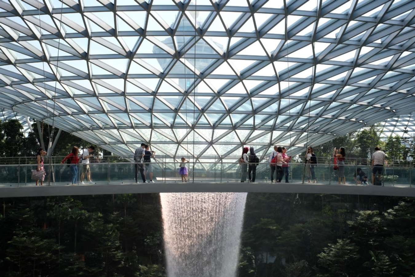 Visitors checking out the waterfall at Jewel Changi.