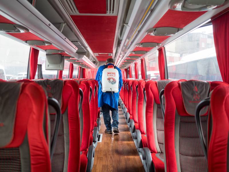 Pembersihan bus dengan disinfektan