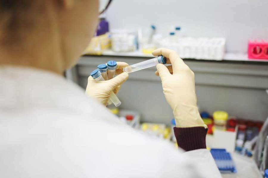 dcotor is testing swab test speciement