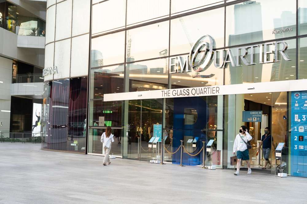 People walk passing through Louis Vuitton Shop at Gaysorn Plaza