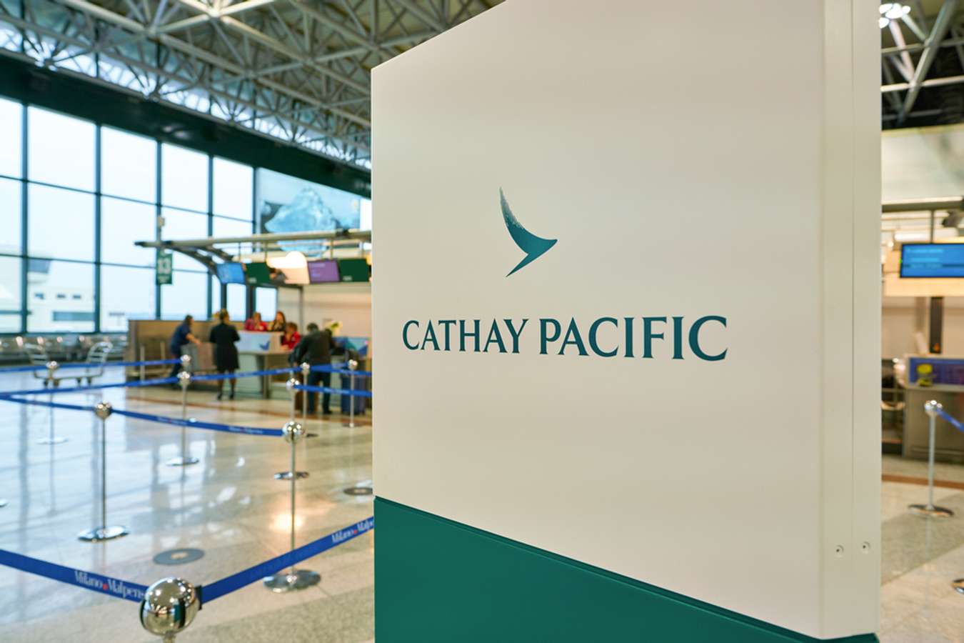 cathay pacific add travel insurance