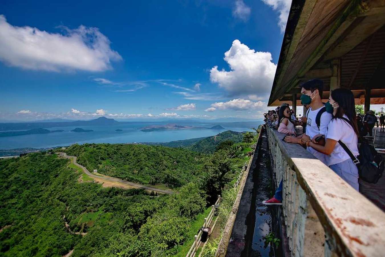 Tourists enjoying the view from People's Park in the Sky