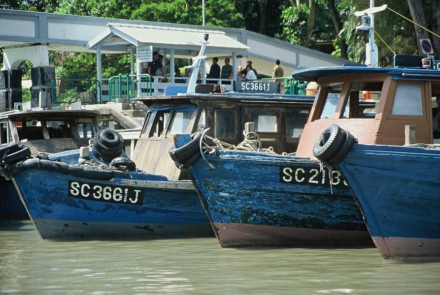 View of ferry boats that take passengers between the wharf at Changi to Ubin Island a popular weekend destination off the coast of mainland Singapore