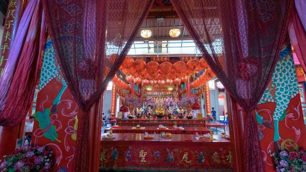 How to pray to Goddess Tuptim at the Yellow Bridge for quick results, along with tips and steps to know in order to enhance luck and success in life.