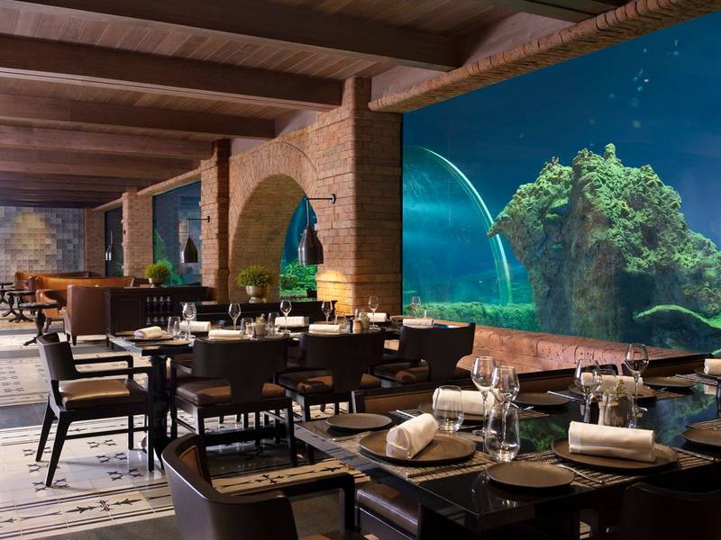 The Apurva dengan restoran dinner di Bali