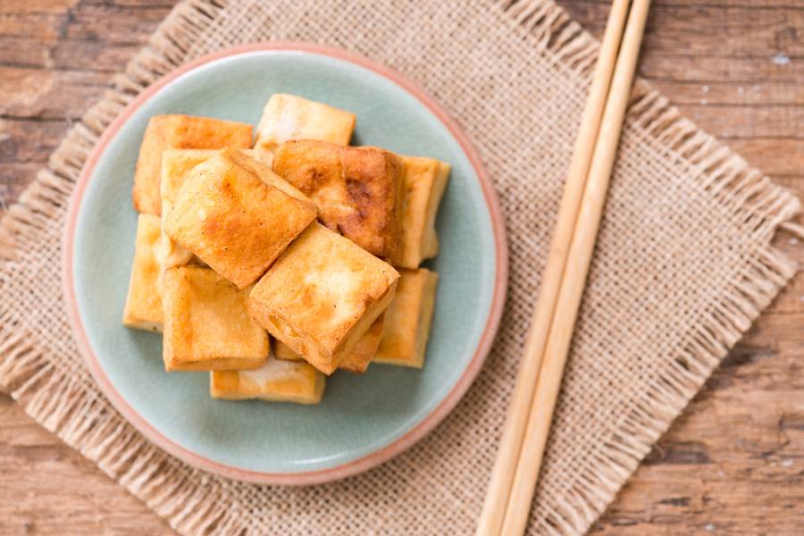 Snack and Dessert, Chinese Traditional Deep Fried Tofu or Fried Bean Curd  on wood background