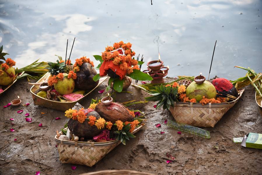 For Chhath Puja, various types of traditional pooja materials, fruits and flowers are placed near the pond at sagar pond, bikaner 
