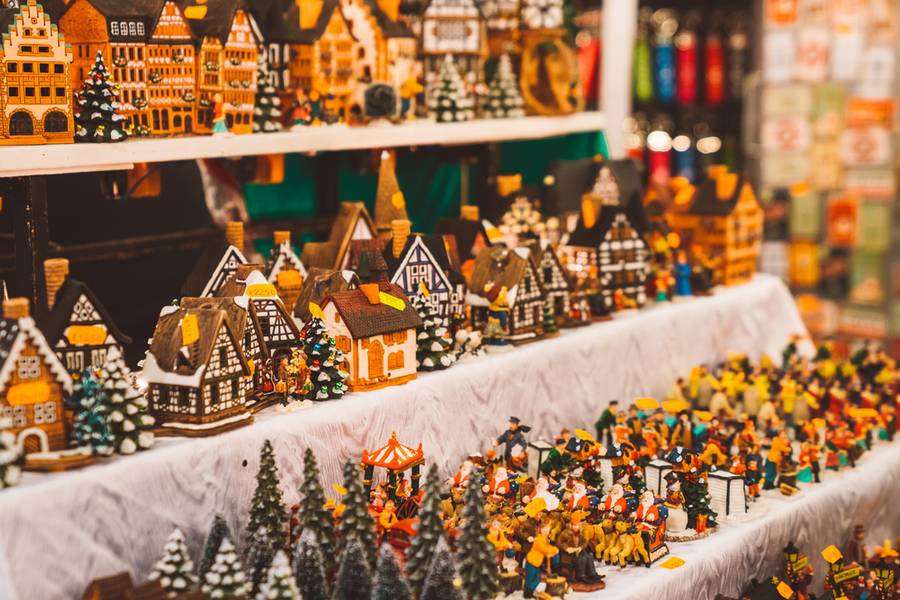 Cute Christmas toys and presents and the Christmas market in Frankfurt, Germany. Small tree toys, carousel and other sculptures. New years eve spirit.