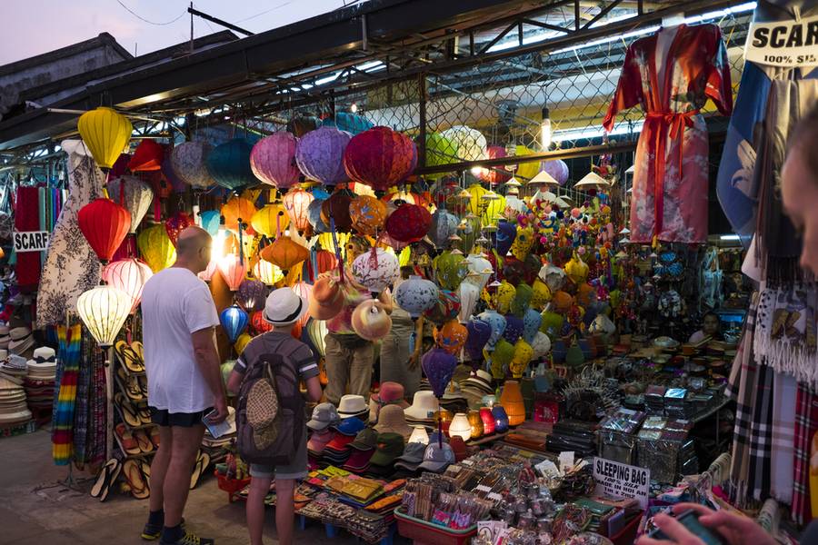 Lantern seller in the streets of ancient town of Hoi An in Central Vietnam 