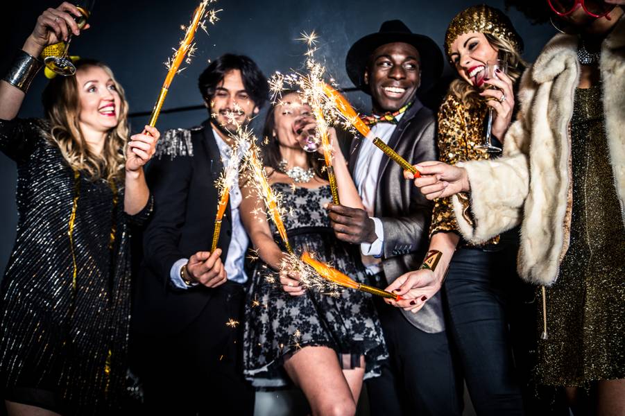 Multi-ethnic group of friends celebrating in a nightclub - Clubbers having party