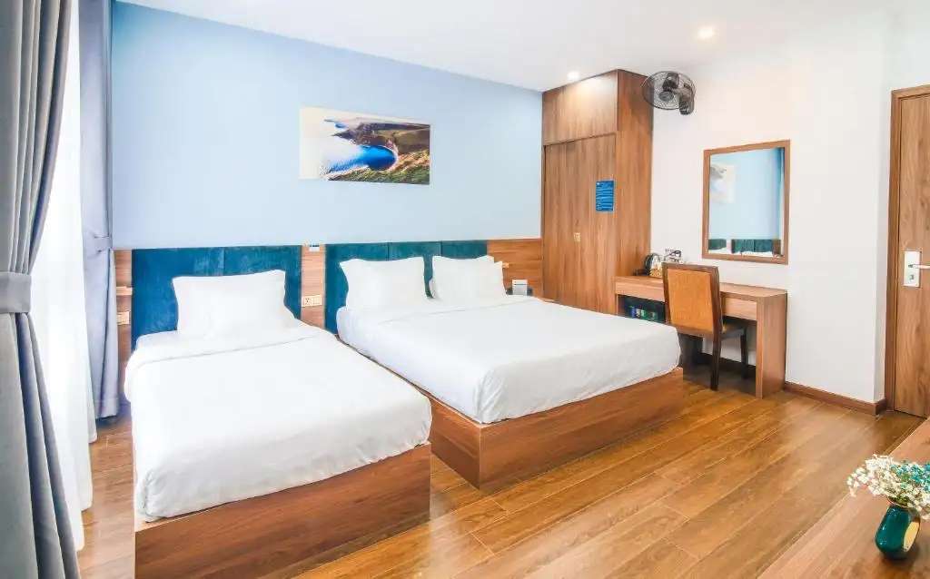 Không gian phòng ngủ Family Riverview tại Grand Lee Hotel