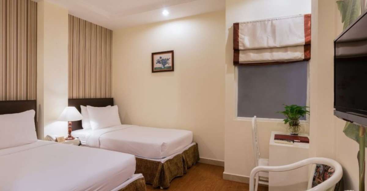 Không gian phòng 2 Single Bed Cosy No Window tại Asian Ruby Center Point Hotel
