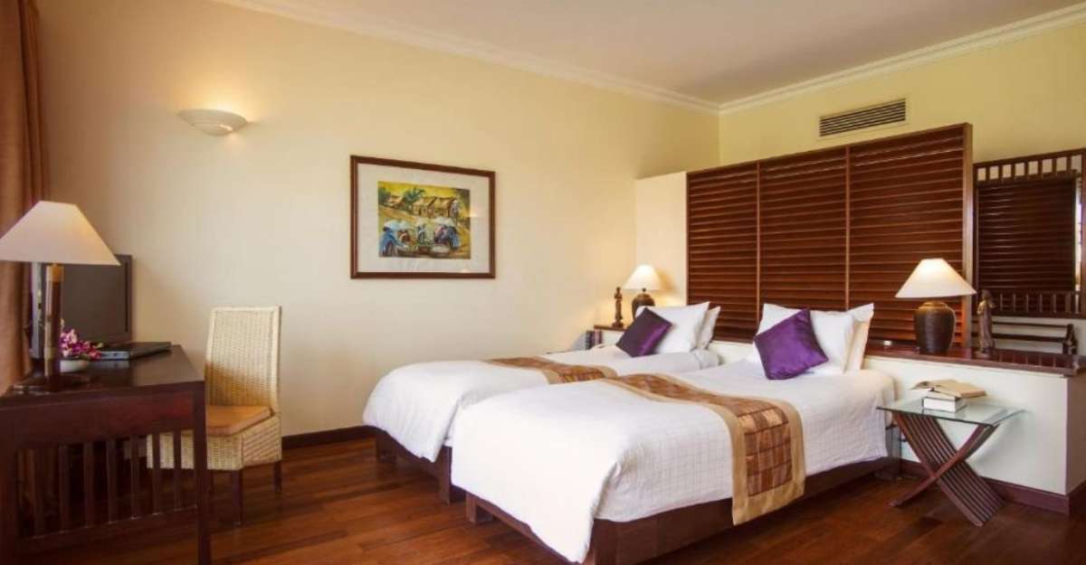 Không gian phòng Deluxe Twin tại Victoria Hoi An Beach Resort and Spa