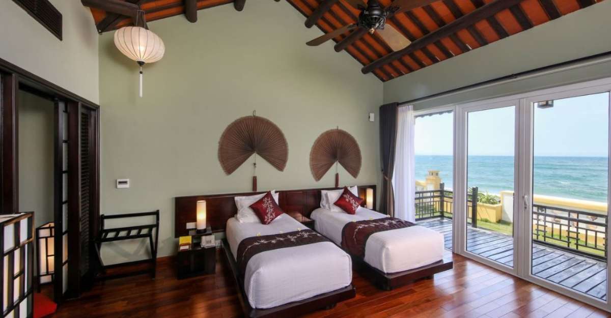 Không gian phòng Junior Suite Twin tại Victoria Hoi An Beach Resort and Spa