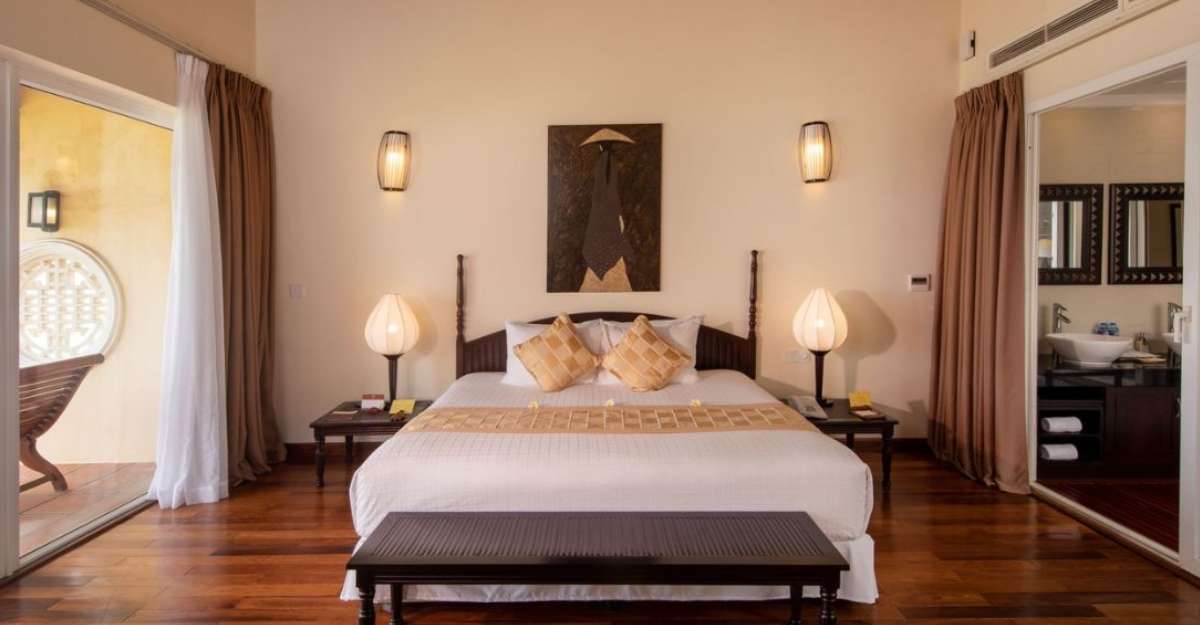 Không gian phòng Victoria Suite tại Victoria Hoi An Beach Resort and Spa