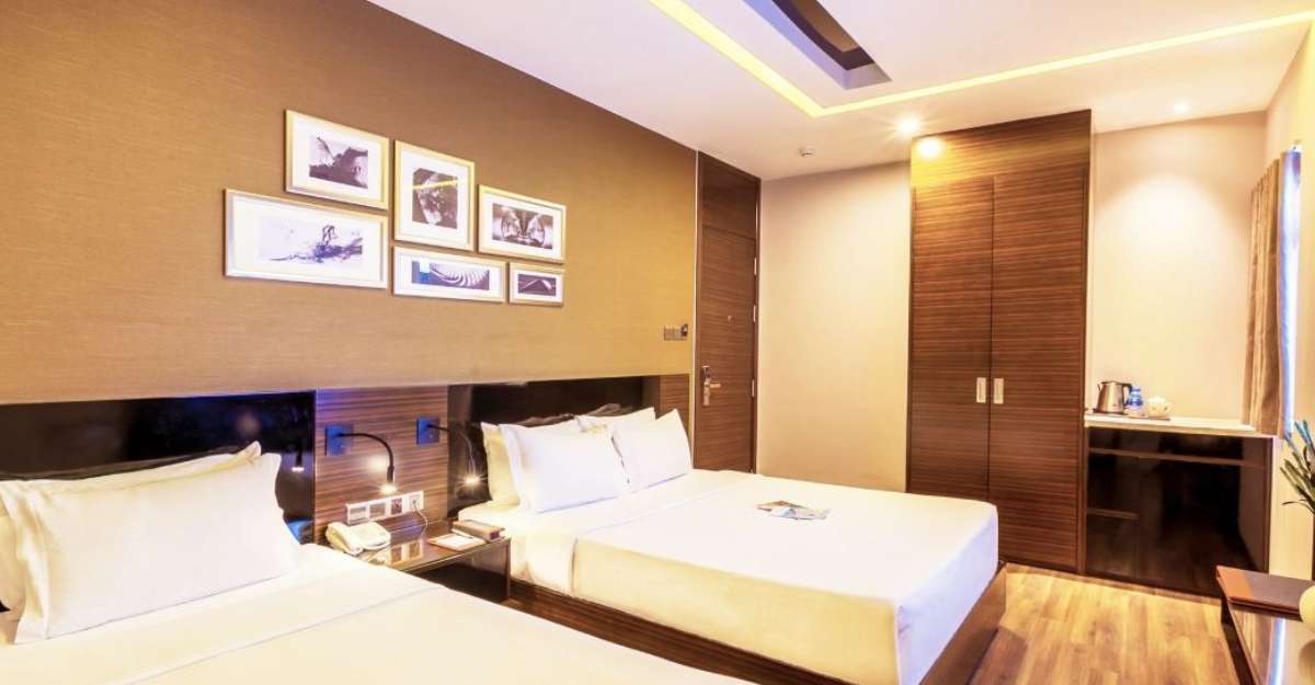 Deluxe Triple tại Queen Ann Hotel vô cùng phù hợp với nhóm bạn hay gia đình nhỏ