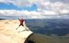 Gaze down in awe at Jamison Valley from the edge of Lincoln's Rock