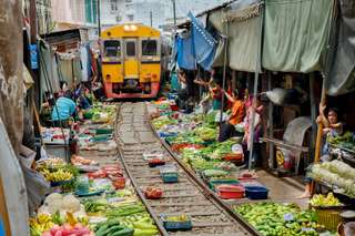 Amphawa Floating Market & Maeklong Railway Train Market Tour– Day Tour (by TripGuru)