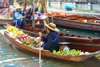 Experience authentic Thai culture as you cruise through it