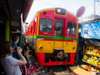 Catch sight of how vendors orderly move their market stalls among all the chaos, just enough to not be harmed by the train as it pulls in