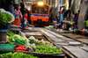 Continue to Maeklong Railway Market for the second part of your day tour