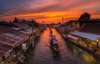 Opt for the weekend package and explore Amphawa Floating Market