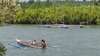 Watch the local residents move around on bangka boats