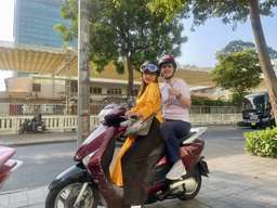 Female Aodai Rider Ho Chi Minh Hidden Gem Sightseeing Tour: Chinatown, Flower Market, Optional Local Food and Vietnamese Coffee Experience | Vietnam