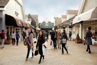 Bicester Village Shopping Trip with Round Trip Rail Transfers from London
