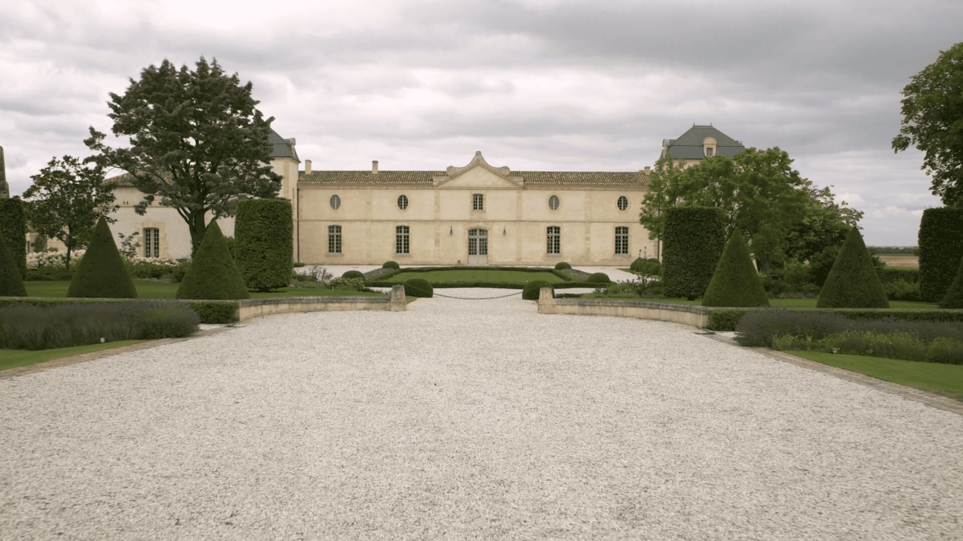 Grand building with garden and pathway