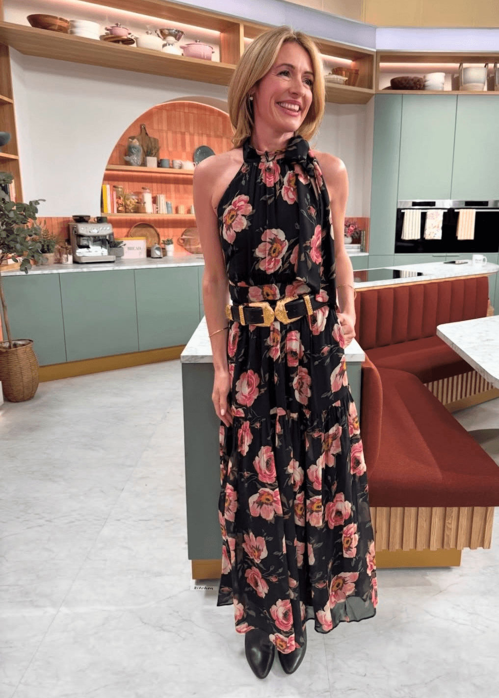 Cat Deeley wearing Boden Roisin Tie Neck Maxi Dress in black floral print while presenting on This Morning
