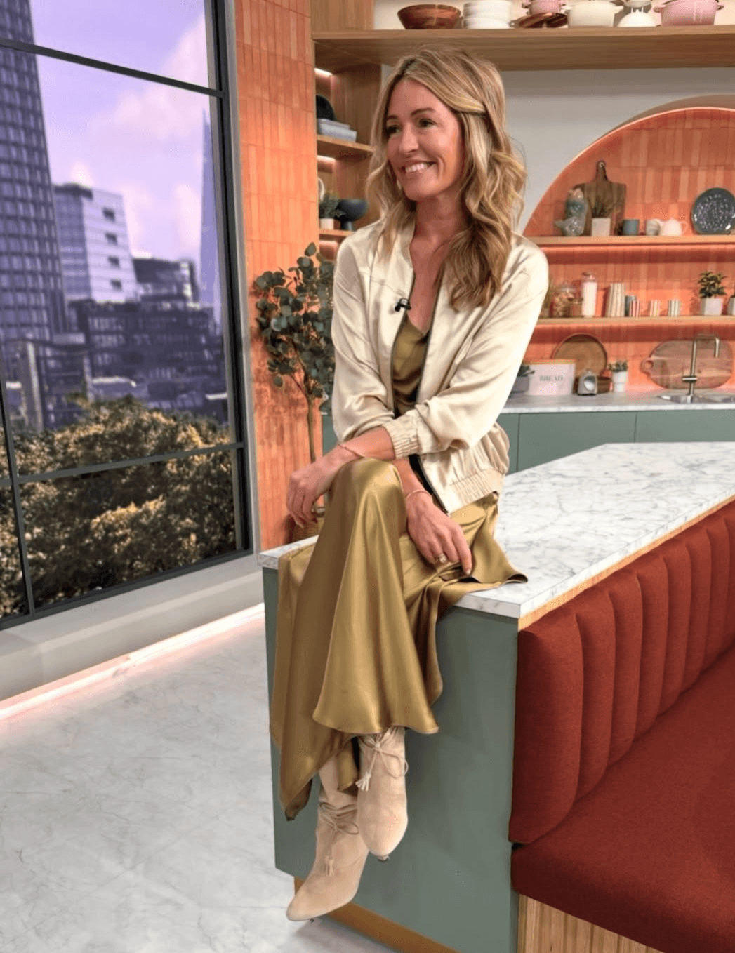 Cat Deeley wearing a Marks & Spencer Autograph satin slip dress with sweetheart neckline and soft ruffle detailing