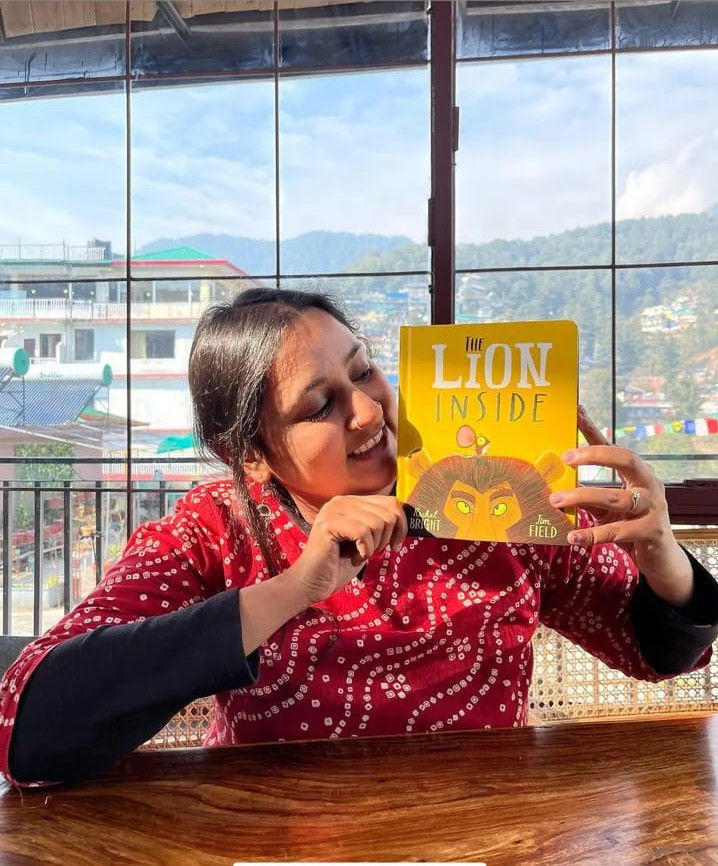 With the book Lion Inside