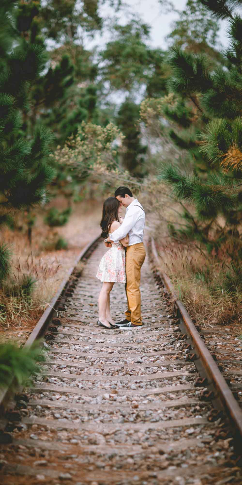 Romantic Couple Railway Track Forest Door Wallpaper close-up pattern texture