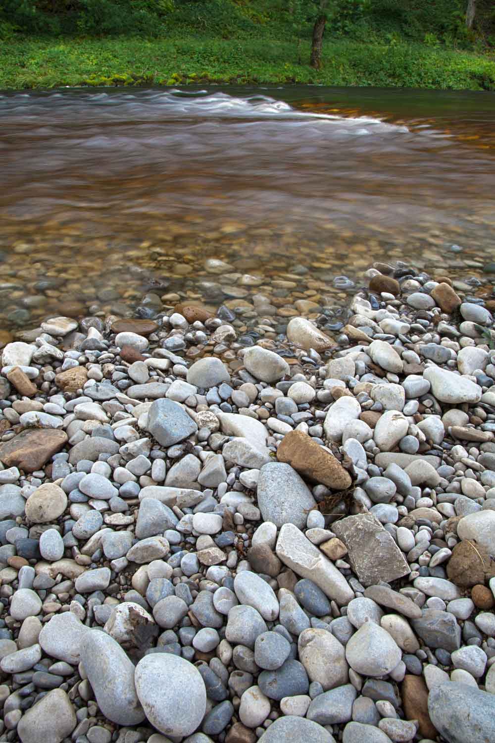 Rocky River Pebble Shore Flowing Water Door Wallpaper close-up pattern texture