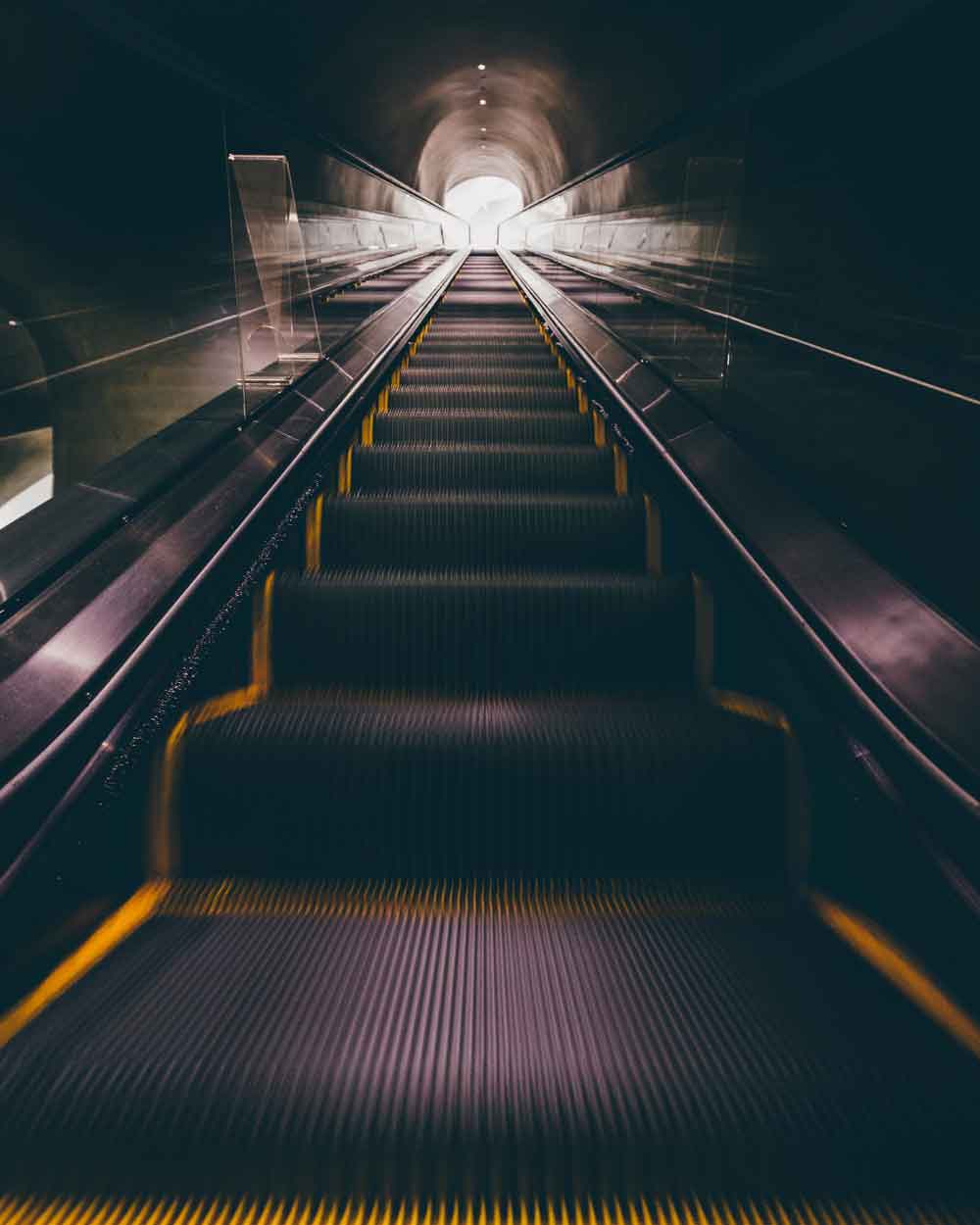 Underground Metro Escalator Tunnel Door Wallpaper close-up pattern texture