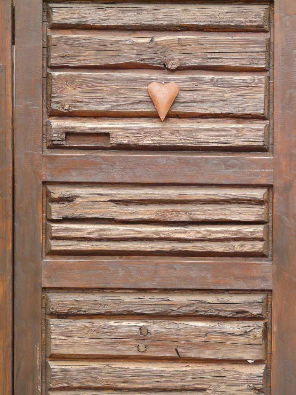 Rustic Weathered Plank Wall Heart Carving Door Wallpaper close-up pattern texture
