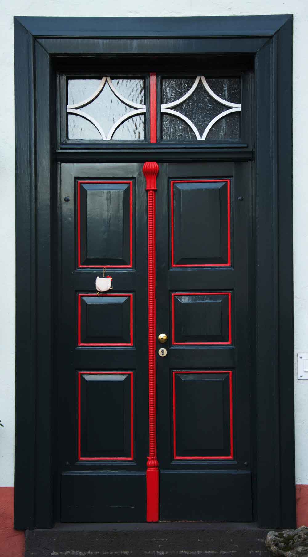 Vintage Black Door with Red Trim Door Wallpaper close-up pattern texture