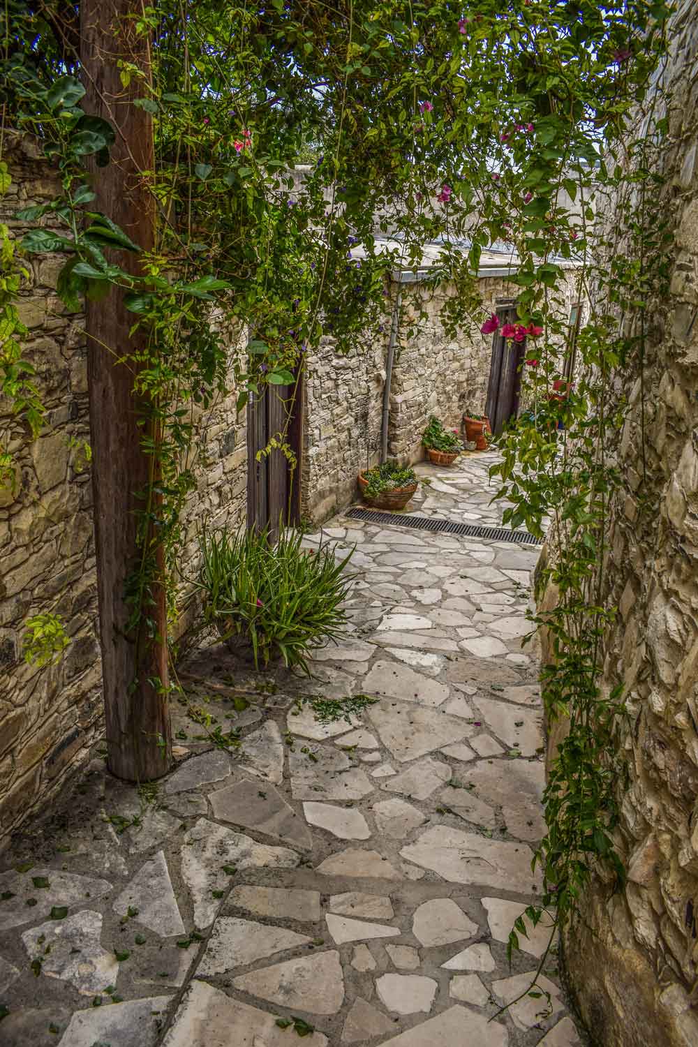 Mediterranean Stone Alley Door Wallpaper close-up pattern texture